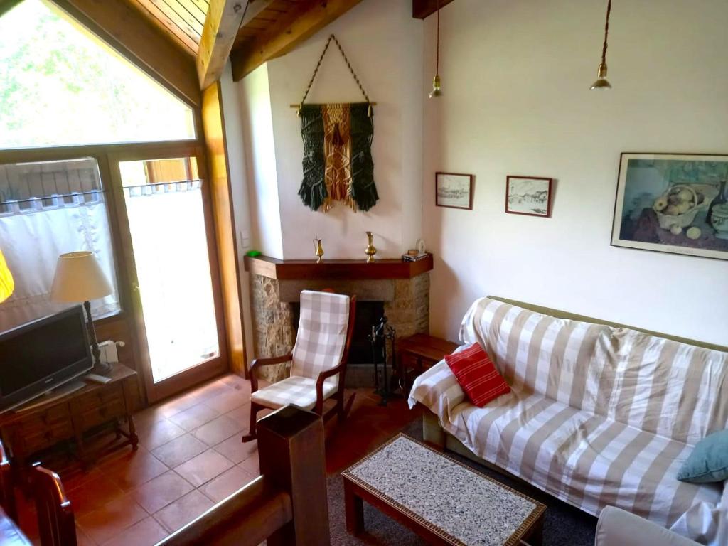 Posezení v ubytování Casa con jardín en Guils
