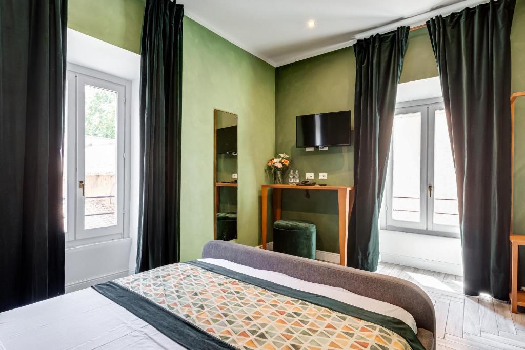 Łóżko lub łóżka w pokoju w obiekcie Ripetta Natural Suites