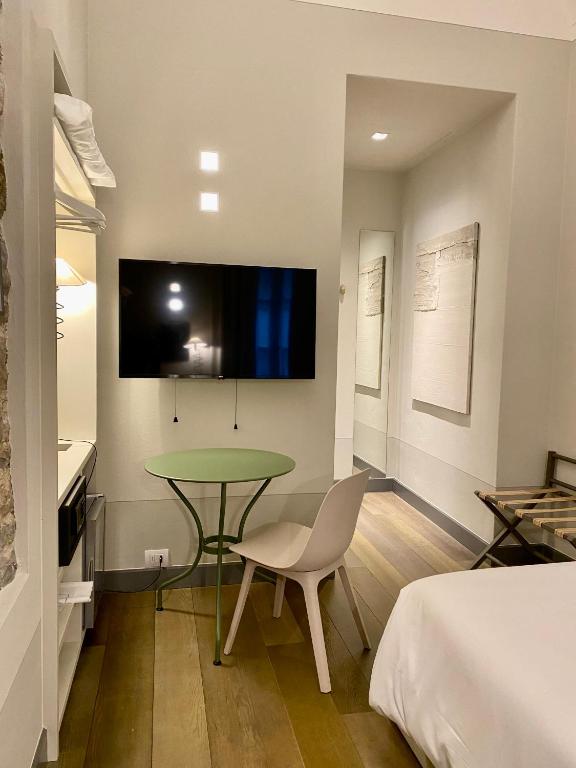 TV a/nebo společenská místnost v ubytování GombitHotel