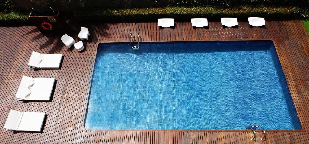 Bazén v ubytování Magnolia Hotel - Adults Only nebo v jeho okolí