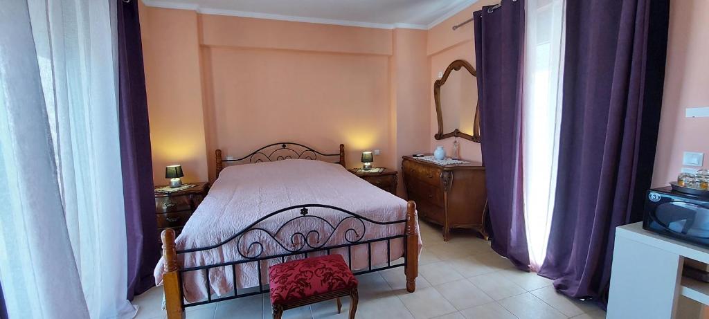 Posteľ alebo postele v izbe v ubytovaní Anastacias Apartment