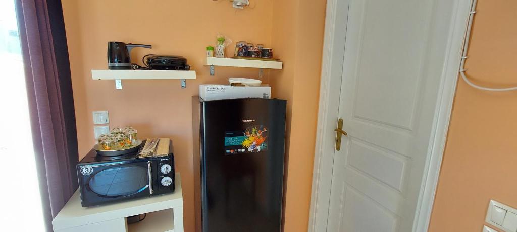 Kuchyňa alebo kuchynka v ubytovaní Anastacias Apartment