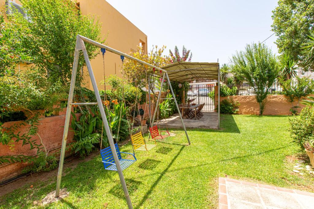 A garden outside Anna's Sea House near to a sandy beach!