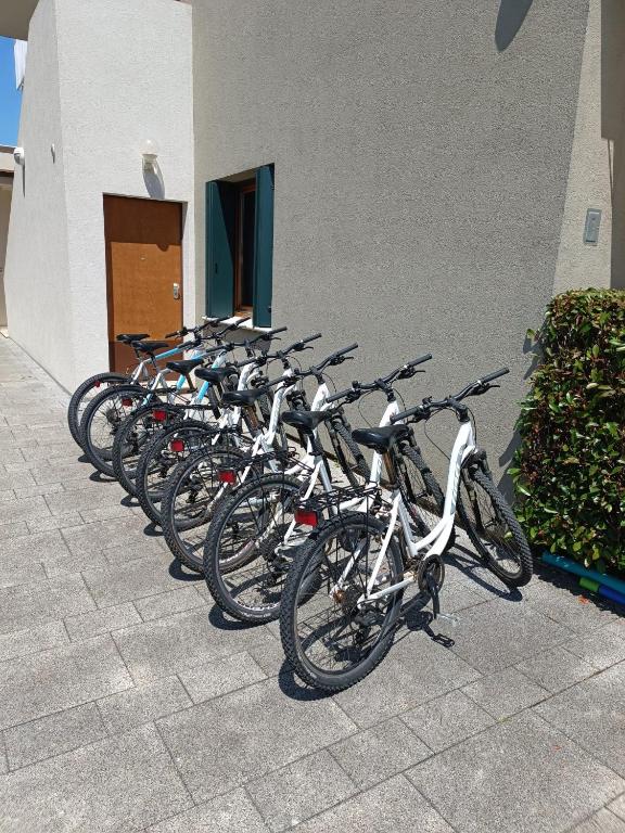 a row of bikes parked next to a building at Maj Luxury Residence in Poreč