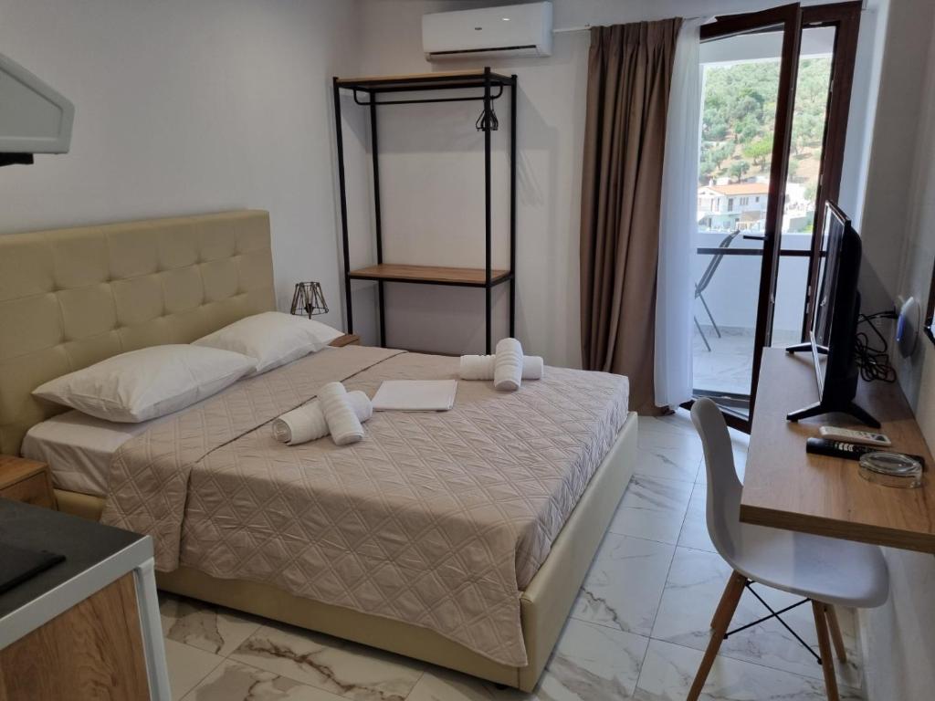 Postel nebo postele na pokoji v ubytování MANGO Skiathos