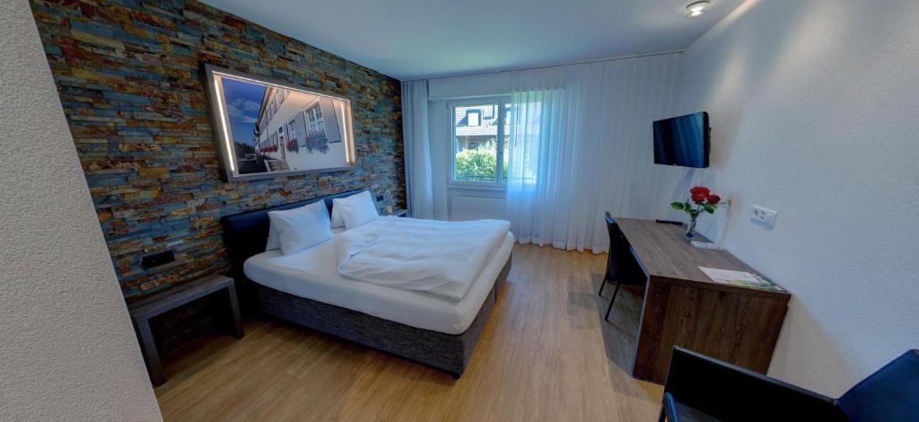 Postelja oz. postelje v sobi nastanitve Hotel Eremitage