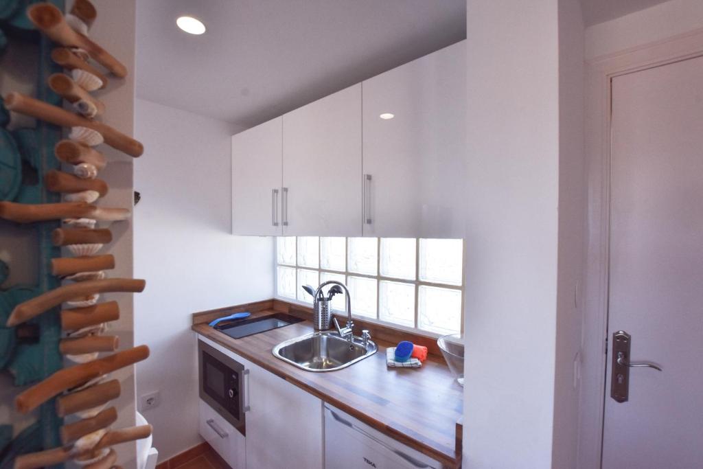 A kitchen or kitchenette at Book Jet - Costa Calma Sun & Pool