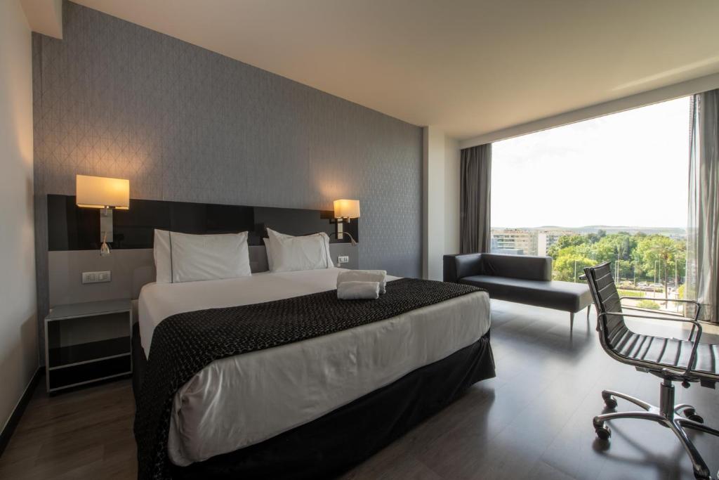 Posteľ alebo postele v izbe v ubytovaní Eurostars Palace