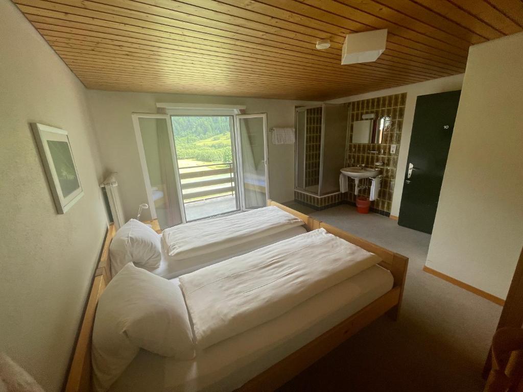 Postel nebo postele na pokoji v ubytování Hotel Restaurant Gommerhof