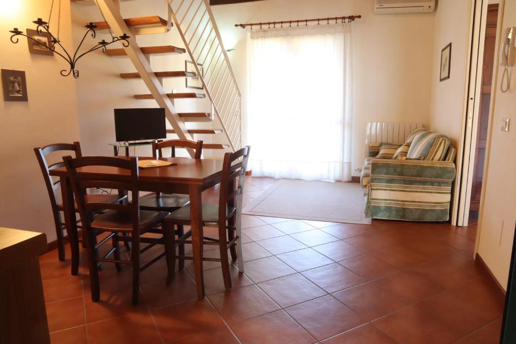Televízia a/alebo spoločenská miestnosť v ubytovaní Relais Cà Nova Guest House