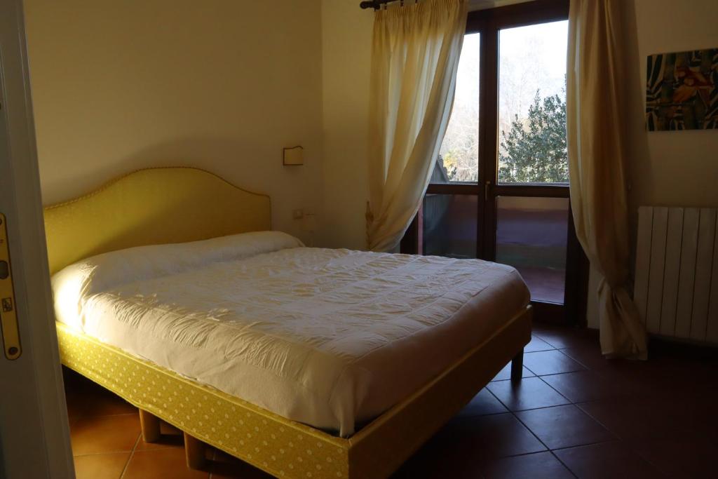 Posteľ alebo postele v izbe v ubytovaní Relais Cà Nova Guest House