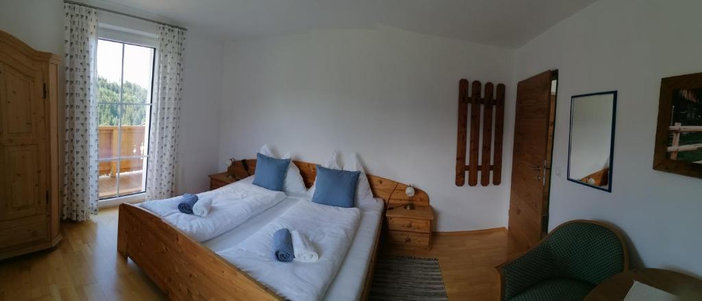 Postel nebo postele na pokoji v ubytování Haus Alexander
