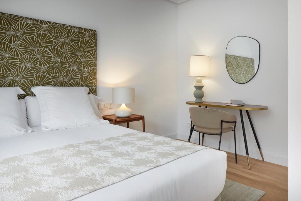 Posteľ alebo postele v izbe v ubytovaní Zubieta Playa 3 by FeelFree Rentals