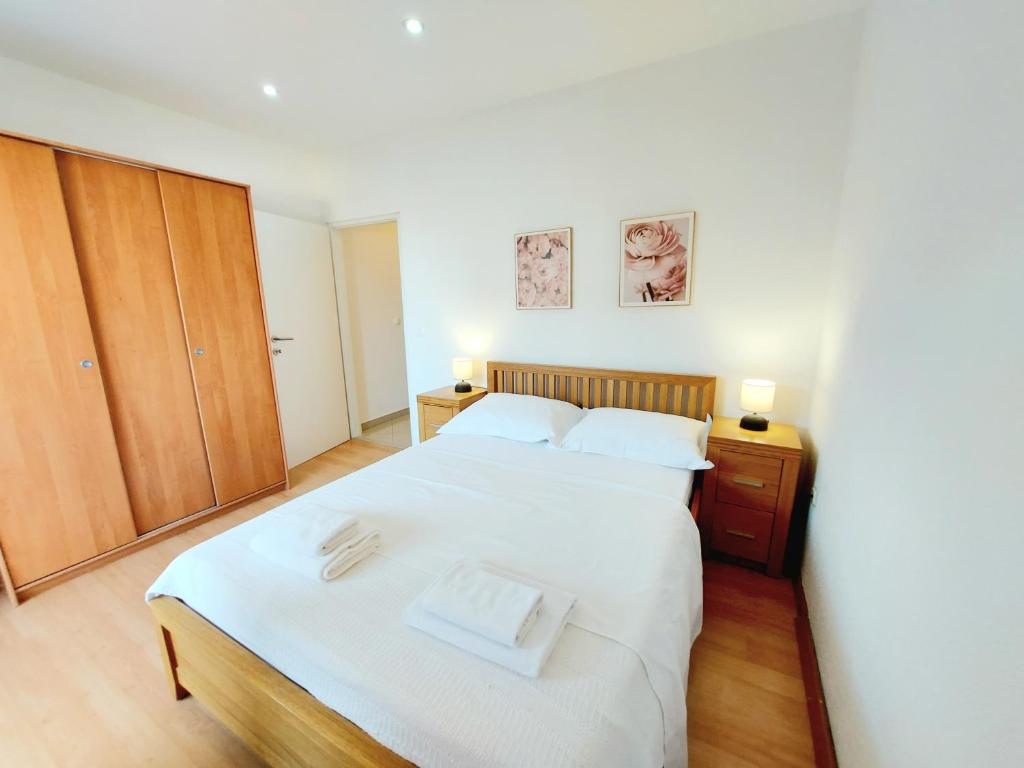 Postel nebo postele na pokoji v ubytování Apartman Anna