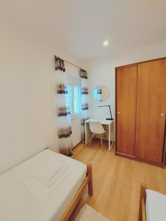 Postel nebo postele na pokoji v ubytování Apartman Anna