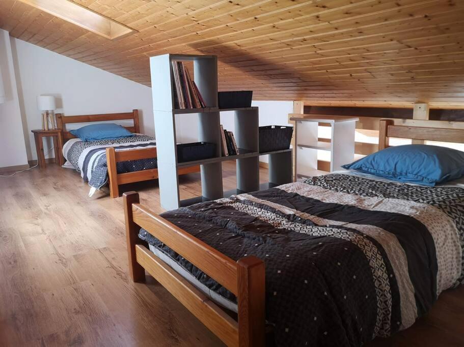 Postel nebo postele na pokoji v ubytování Joli appartement en résidence proche de la plage