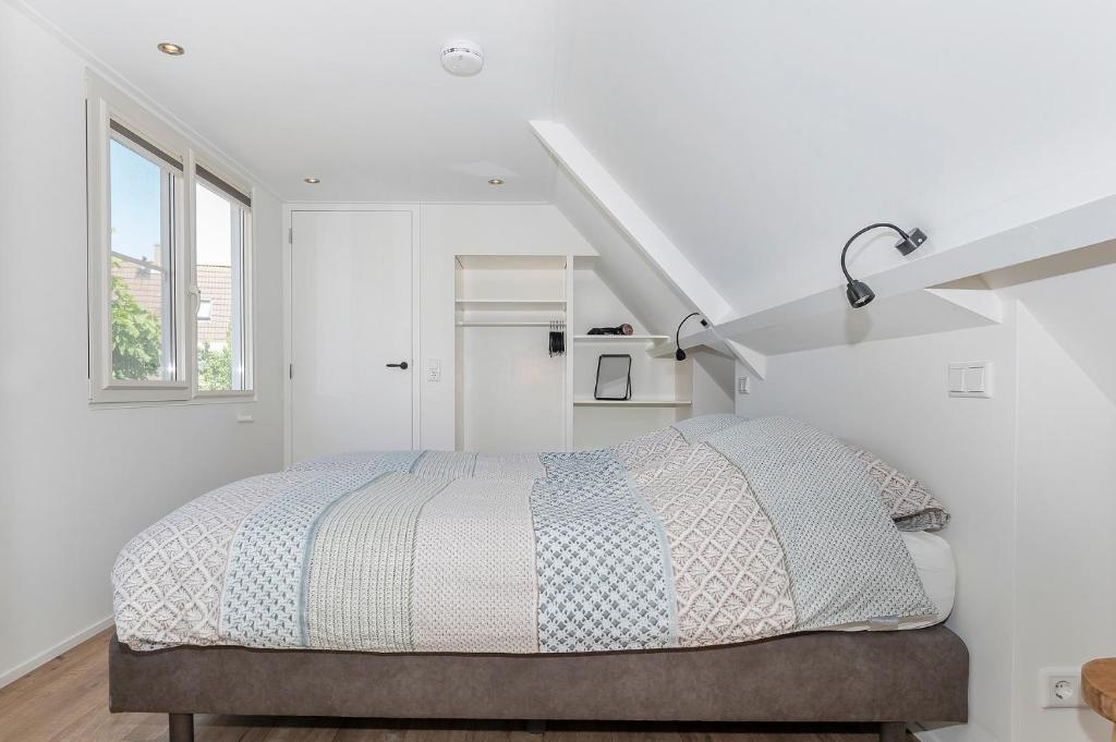 Postel nebo postele na pokoji v ubytování Vakantiehuis '2bijZee' dicht bij Domburg en strand