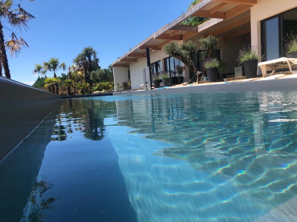 The swimming pool at or close to VILLA EDEN