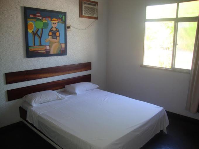Postel nebo postele na pokoji v ubytování Hotel Pousada Terras do Sem Fim
