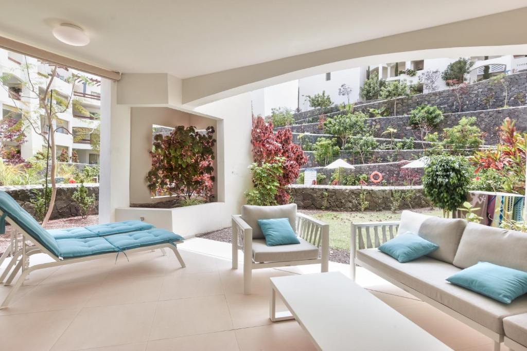 a living room with a couch and chairs at Ancor 0-1 POOL VIEW 2B in Palm-Mar