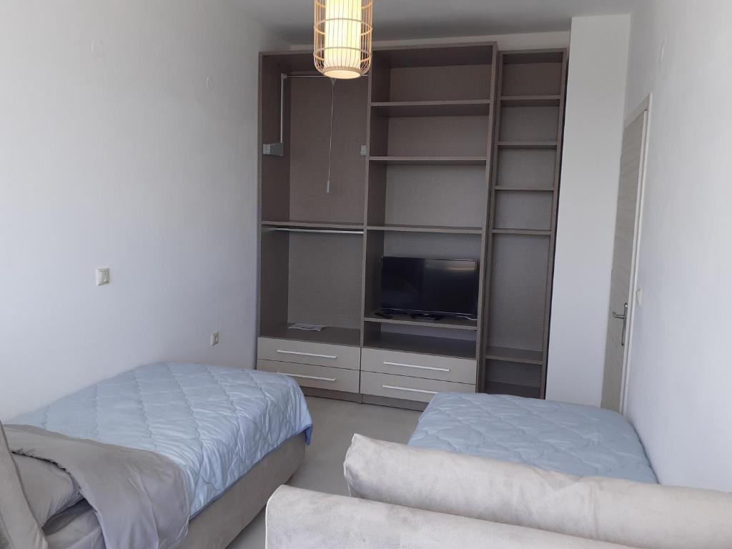 Postel nebo postele na pokoji v ubytování Villas Lago e Mare
