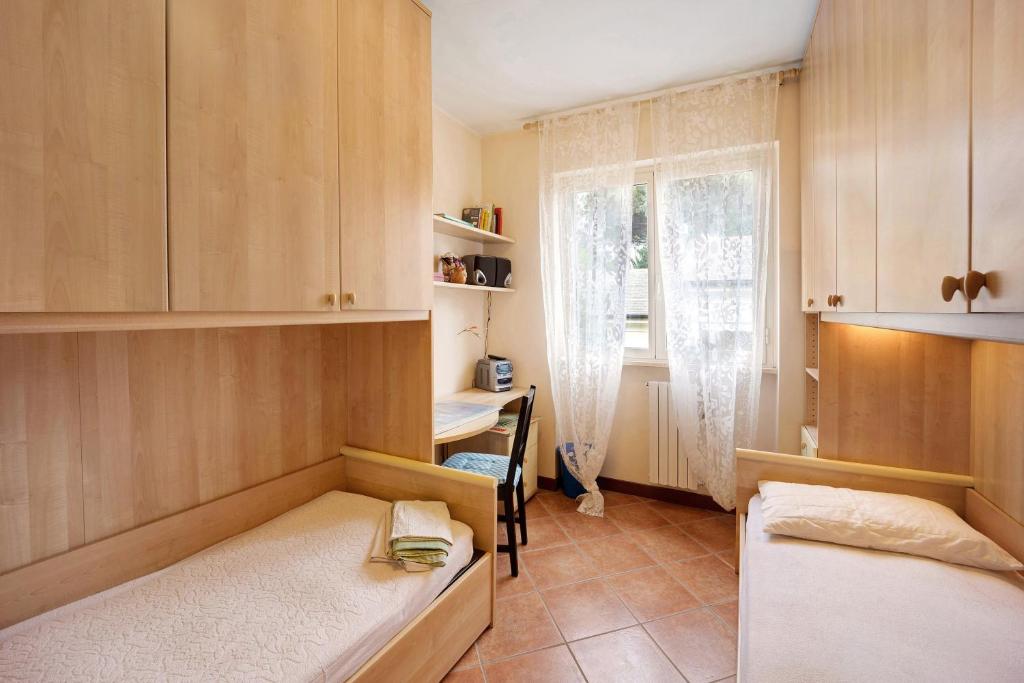 Posteľ alebo postele v izbe v ubytovaní Giosy's Home