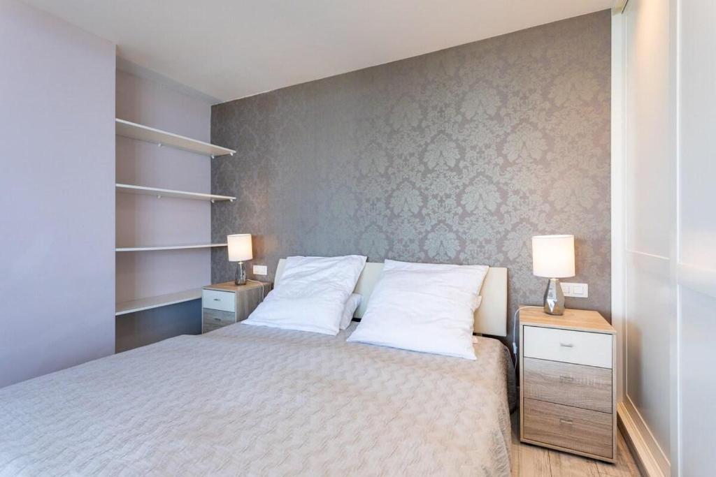 Postel nebo postele na pokoji v ubytování Prime Homes Playa Jardín Studio