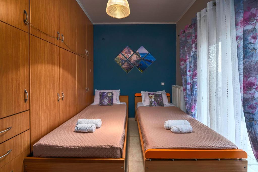 Postel nebo postele na pokoji v ubytování Filios Villa