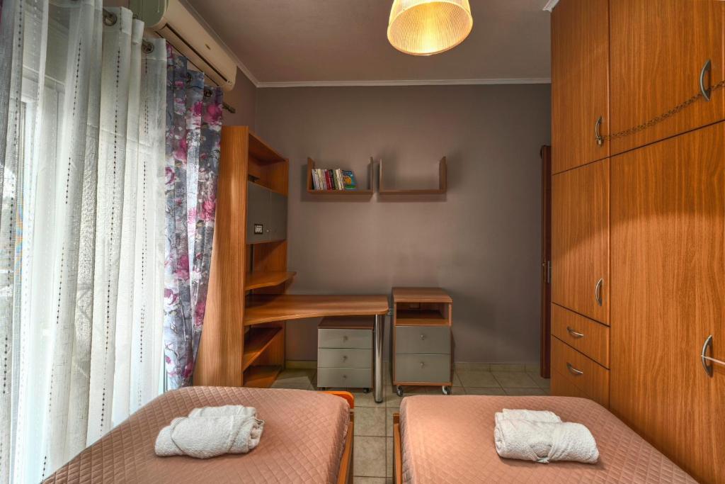 Postel nebo postele na pokoji v ubytování Filios Villa
