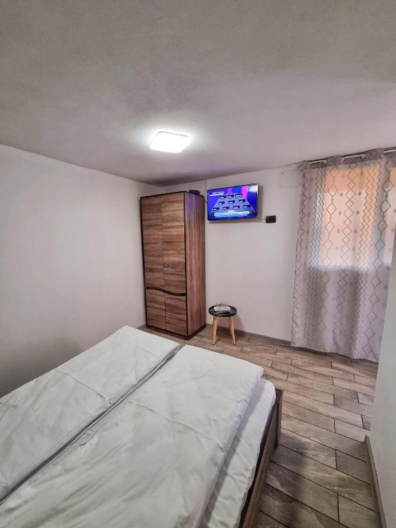 Postel nebo postele na pokoji v ubytování Cabana Vărad Coronini