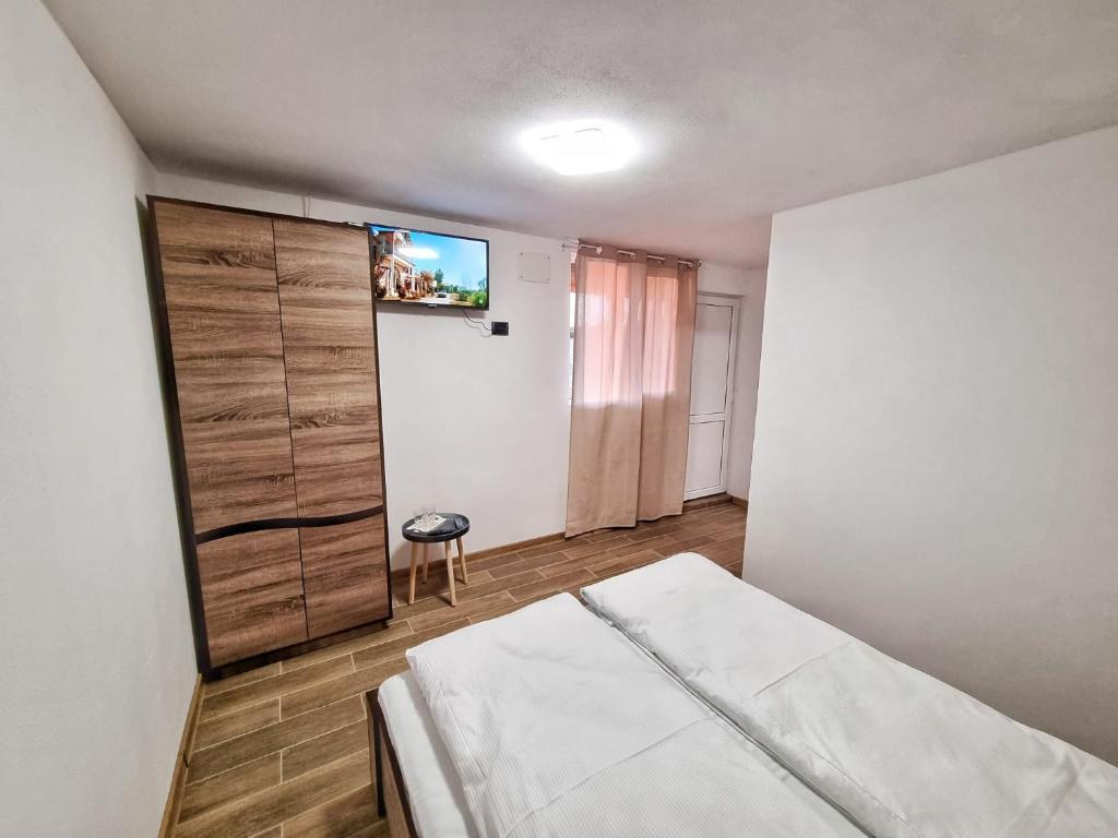 Postel nebo postele na pokoji v ubytování Cabana Vărad Coronini
