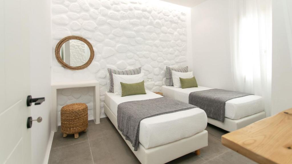 Posteľ alebo postele v izbe v ubytovaní Kamvas Deluxe Apartments