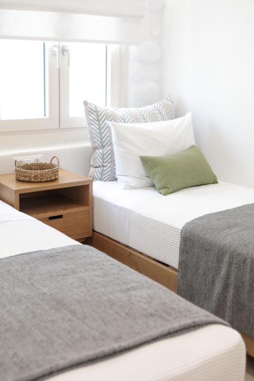 Posteľ alebo postele v izbe v ubytovaní Kamvas Deluxe Apartments