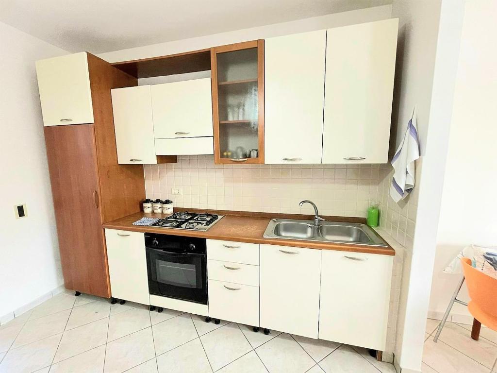 Kuchyňa alebo kuchynka v ubytovaní Casa Orchidea
