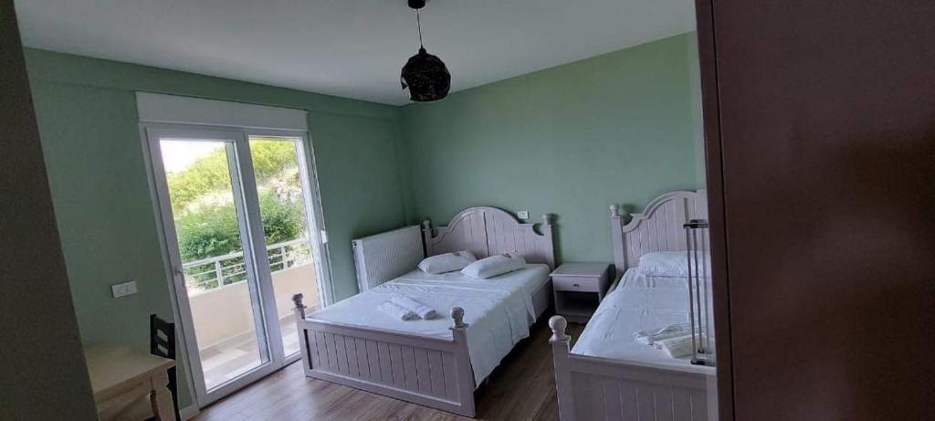Postel nebo postele na pokoji v ubytování HOTEL VILA TOSKA