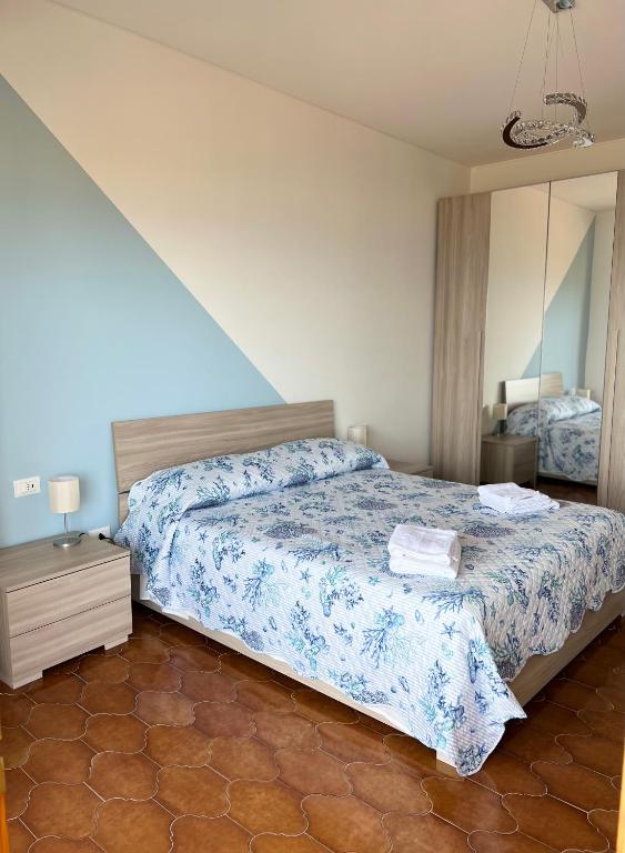 Łóżko lub łóżka w pokoju w obiekcie Special Home VISTA MARE e Parcheggio privato