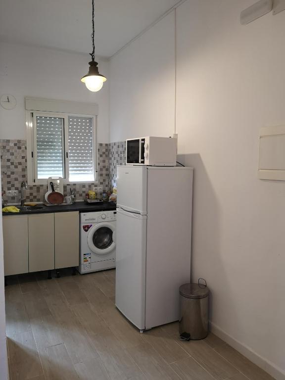 A kitchen or kitchenette at Centro de Sevilla