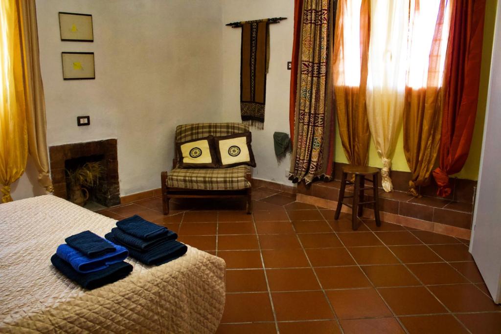 Postel nebo postele na pokoji v ubytování Villa Lancellotti