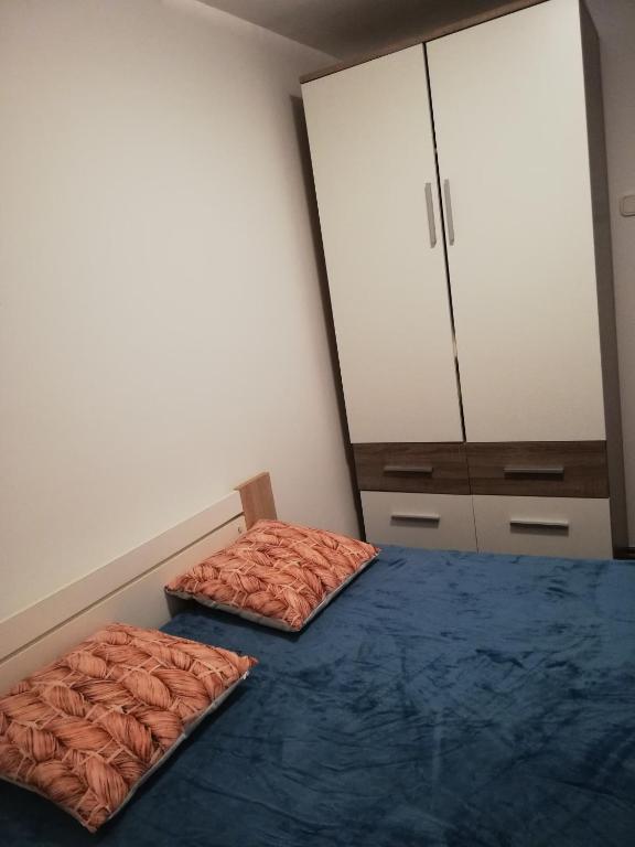 Posteľ alebo postele v izbe v ubytovaní Apartman Cvita