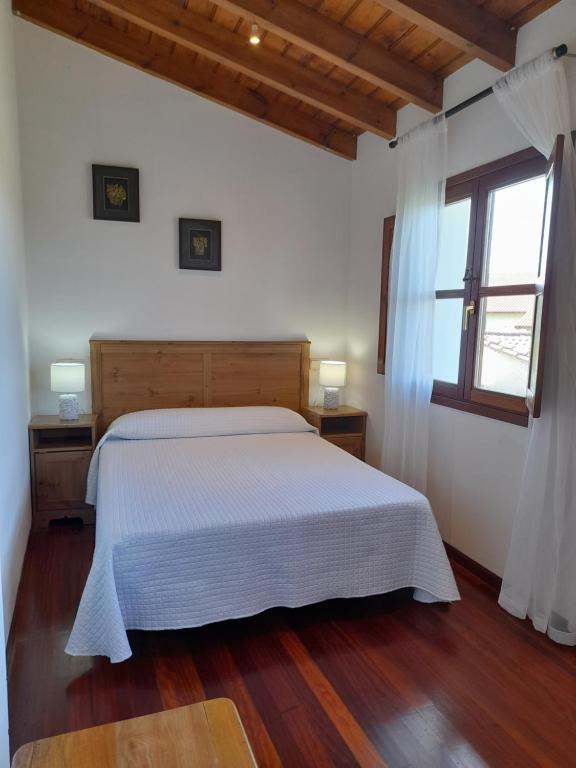 Postel nebo postele na pokoji v ubytování Gestiona2R - Casa con finca en Pendueles al lado de la playa