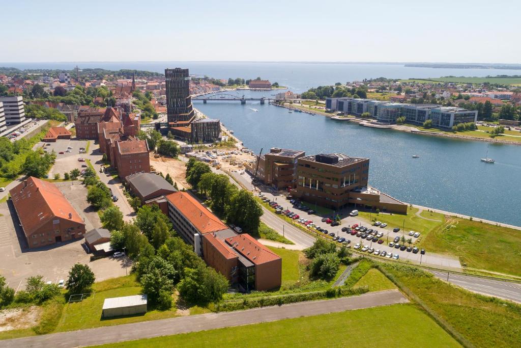 an aerial view of a city with a river at Hotel Sønderborg Kaserne in Sønderborg