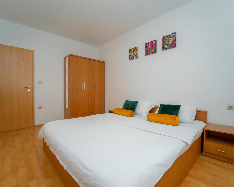 Postel nebo postele na pokoji v ubytování Apartments Baresic