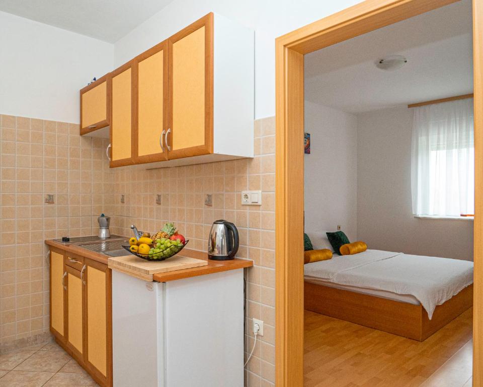 Kuchyň nebo kuchyňský kout v ubytování Apartments Baresic