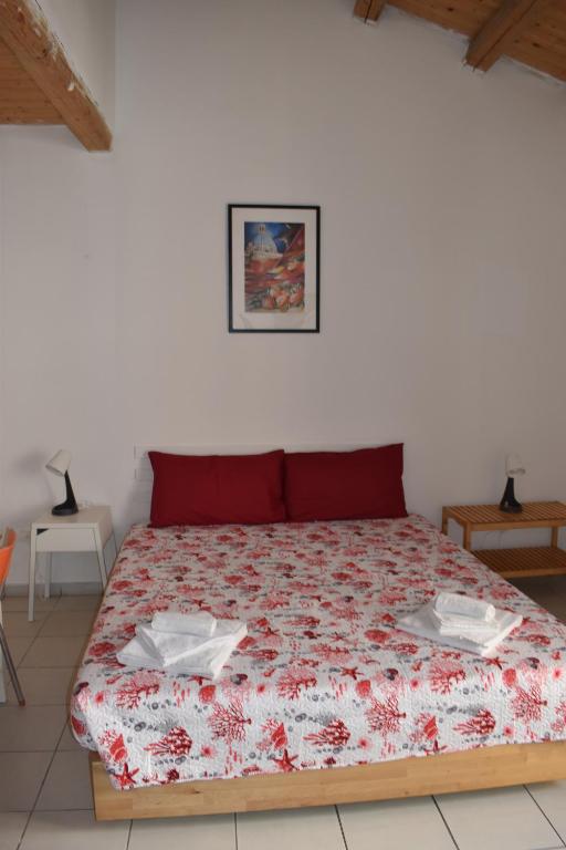 Posteľ alebo postele v izbe v ubytovaní atocà3 casa vacanze - vedi anche atocà1 e atocà2