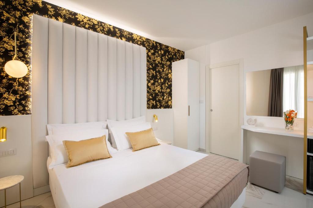 Postel nebo postele na pokoji v ubytování Hotel Cenisio