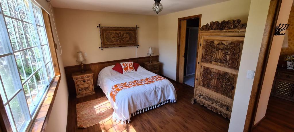 Postel nebo postele na pokoji v ubytování Quinta Tere Hotel & Gallery