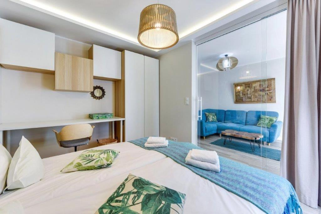 Posteľ alebo postele v izbe v ubytovaní GRANO FLATS Gdańsk - Chmielna 73