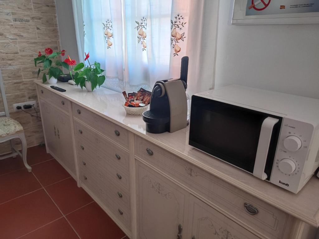 TV a/nebo společenská místnost v ubytování Villa Rosa