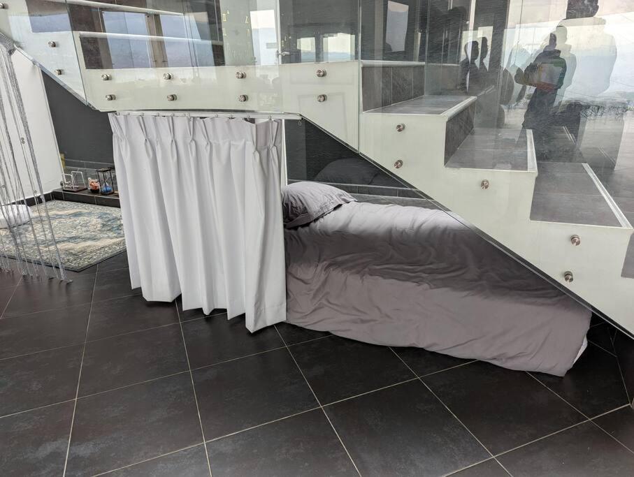 Postel nebo postele na pokoji v ubytování Nomad Finca
