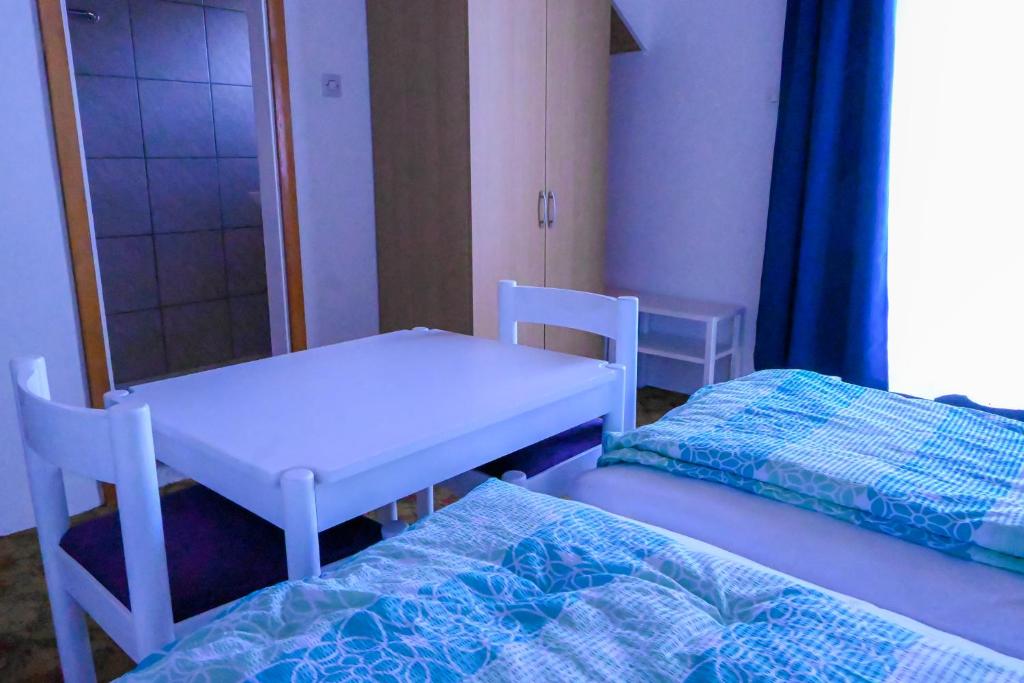 Postel nebo postele na pokoji v ubytování Sobe GRAJSKA